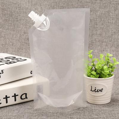 China Barrier Size Cheap Custom LOGO Thickened High Quality Transparent Stand Up Drink Bag Packaging Plastic Spout Pouch for sale