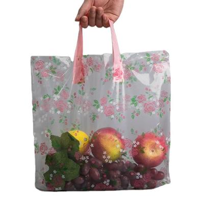 China 2021 china custom logo handle plastic bag LDPE moisture proof custom flower design transparent reusable shopping eco for sale