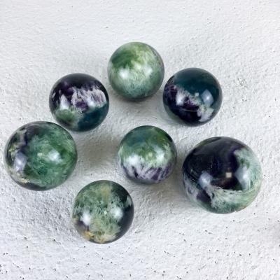 China Beautiful Natural China Snowflake Fluorite Crystal Ball Sphere For Decoration for sale