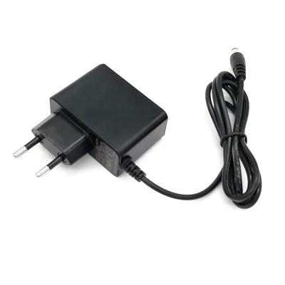 China Low Power Consumption TUV CE GS Certificate 230v AC Input DC Power Supply 9v 0.5a 0.6a 9v 500ma 600ma ac/dc Power Adapter for sale