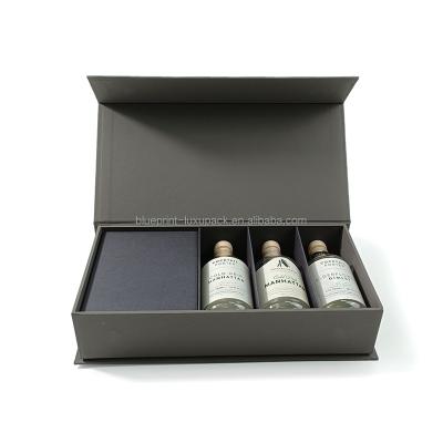 China Recycled Materials Custom LOGO Printed Luxury Rigid Magnetic Whiskey Cardboard Paper Box For 3 Whiskey Bottles 100ml for sale