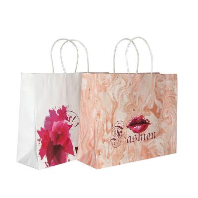 China Handmade advertising gift bag kraft paper bag with handle handbags online shopping can print logo and pattern. for sale