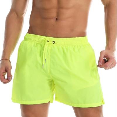 China Summer Men's Breathable Swimwear Shorts Swim Trunks Solid Low Waist Breathable Beach Wear Surf 2021 New for sale