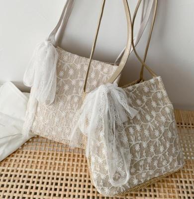 China Other cute straw bag for 2021 new summer beach fashion handbag women lace up shoulder bags for sale