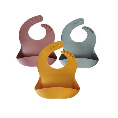 China Viable Wean Customsized Printed Colorful Bibs Adjustable Non Messy Silicone Baby Bibs for sale