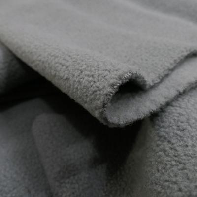 China Anti Pill 288F 290 GSM Soft Touch Micro Fleece Fabric Thick High Quality Even Plain Dyed Dark Gray In Knitted As Lining For Clothing for sale