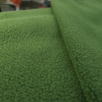 China Anti Pill Hot Selling Thick Soft Touch 288F 240 GSM Micro Fleece Fabric Thick High Quality Micro Fleece Plain Dyed Green In Knitted As Lining For Clothing for sale