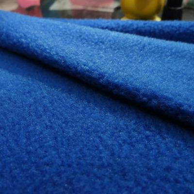 China Cheap anti pill common contact fleece plain dyed one side brushed fabric and anti pilling side blue in knitted as lining for clothing for sale