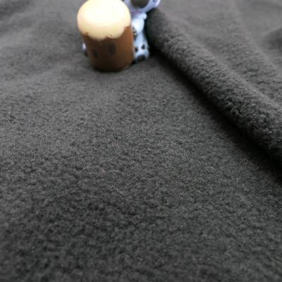 China Cheap anti pill common touch fleece plain dyed one side brushed fabric and anti pilling black in 285GSM knitted for apparel for sale