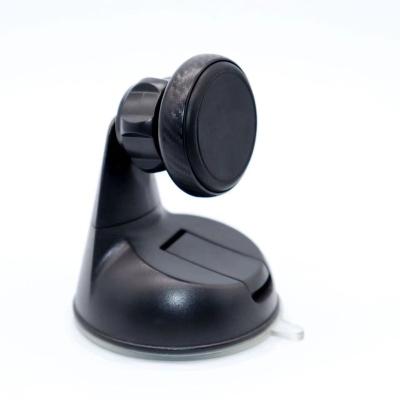 China Car Phone Navigation Holder Adjustable Universal All Phone Sucker Base Texture Around Magnetic Car Phone Mount for sale