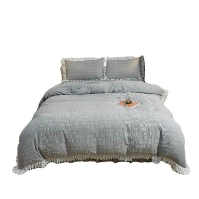 China New Style Anti-Static American Cotton Seersucker Microfiber Ruffled Bedding Set for sale