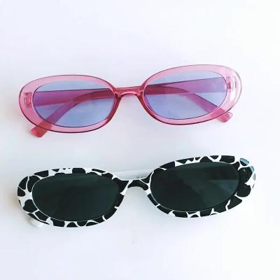 China Hot Selling Oval Personalized Cowlight Sunglasses Small Frame Women Sunglasses for sale