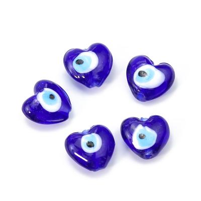 China Jewelry Using Natural Shell Carving Blue Devil Eyes Heart Shape Shell Beads Loose Bead For Necklace Bracelet Jewelry Designs Making for sale