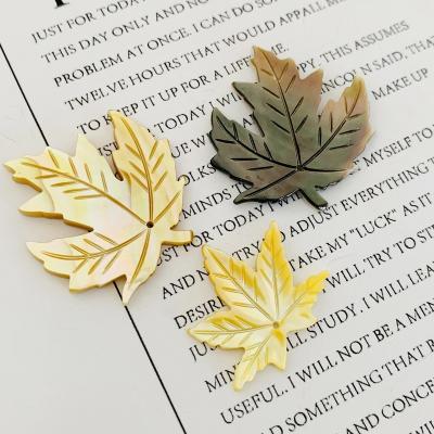 China Decorative Natural DIY Leaf Charm Shell Material Hand Carved Maple Pendants Jewelry for sale