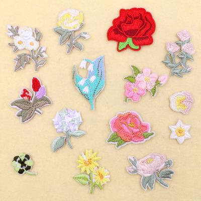 China Sustainable Wholesale 14pcs Hot Selling Stock Price Iron On Flower Embroidered Patches For Clothes for sale