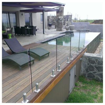 China Modern Frameless Interior Stair Guard Railing Design Stainless Steel Clamp Spigot Temper Glass Railing Stainless Steel for sale