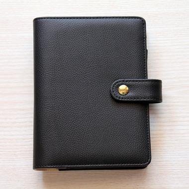 China High Quality Daily In Pure Black Business PU Leather Binder A6 Personal Planner With Snap Closure for sale