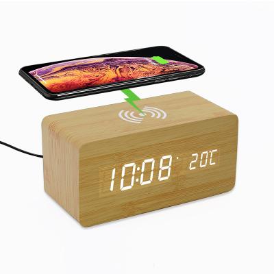 China Wooden Calendars H6007 LED Desktop Alarm Clock With Display Table Alarm Clock Wireless Charger Led Sound Control Clock for sale