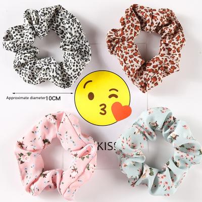 China Simple Cute Fashion Ladies Hair Ring Leopard Fabric Print Hair Tie Ponytail Large Intestine Promotional Hair Tie for sale