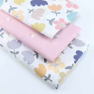 China TWILL Cotton Twill Cartoon Flower Cute Bone Sewing Fabric Making Bedding Home December Handmade Fabric for sale