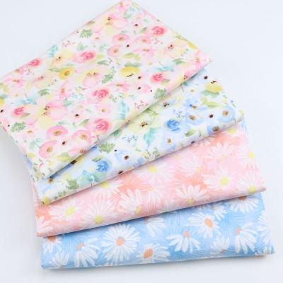 China Blue Rose Floral Twill Sewing Fabric Cotton Shrink-Resistant Making Bedding Home December Handmade Fabric for sale