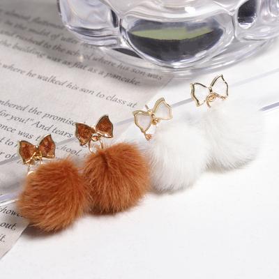 China Environmentally Friendly Autumn And Winter Plush Cute Cat Ear Earrings S925 Sterling Silver Needle Butterfly Sweet for sale