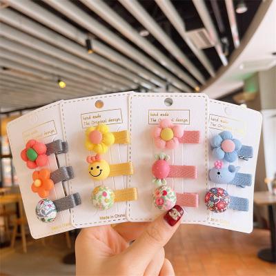 China New children's hair hairpin accessories cartoon flowers soft headdress does not hurt hair cute smiling side clip hits platypus clip for sale