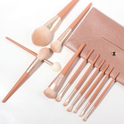 China Angular Blush 2022 New Arrive 11pcs Coral Color Cosmetic Synthetic Wool Hair Wood Handle Makeup Brush Set for sale