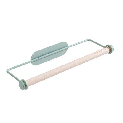 China Lazy paper holder no hanging hole plastic wrap shelving roll holder kitchen paper towel rack minimalist ironwork towel rack for sale