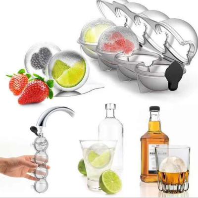 China Amazon Hot Selling Four-hole Whiskey Round Ice Hockey Cube Tray Ball Mold 4 Hole Ice Maker Reusable Cooler Stocked for sale