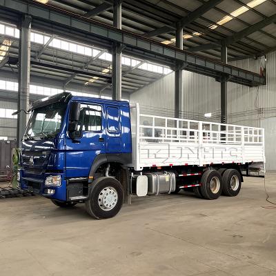 China sinotruck truck price used howo heavy duty barrier cargo truck 6X4 stake 380hp cargo truck truck 11984x2496x3115mm for sale