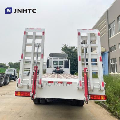 China Sinotruk 12wheels 371hp howo 8x4 40T cargo leather flatbed truck with 2 ladders for sale