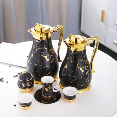 China Viable Luxury Black Gold Plated Unique Marbling Arabic Coffee Set In Ceramic Glass Luxury Turkish Arabic Tea Coating Saucer Cup Coffee Pots for sale