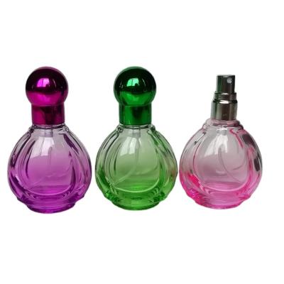 China Morden Free Sample 20ml Wholesale Portable Round Head Spray Bottle Vintage Empty Colored Glass Perfume Bottle for sale