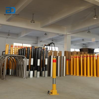 China Flexible Carbon Steel Spring Fold Down Disabled Parking Lot Protector Post for sale