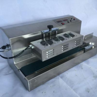 China LGYF-1500A-II semi automatic GARMENT aluminum foil sealer continues induction sealer machine electric plastic bottle sealing machine for sale