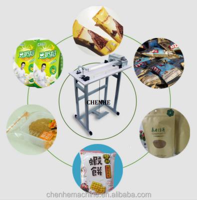 China SFTD-600 CLOTHING by type foot heating sealing machine for plastic bags with CE for sale