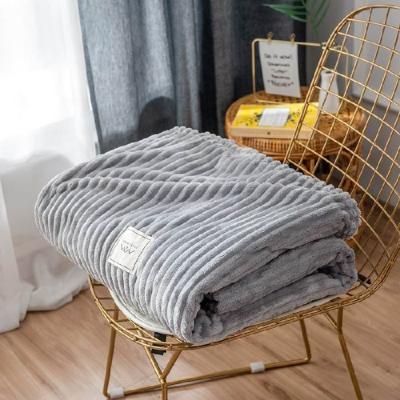 China PORTABLE New Magic Custom Design Knitted Single Color Fleece Blanket Flannel Strip Throw Blanket For Sofa for sale