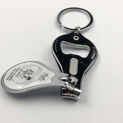 China Promotion around custom logo nail clippers with key chain and bottle opener for sale