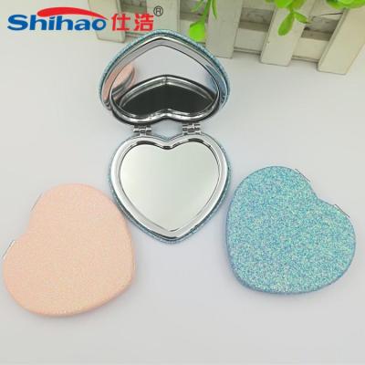 China Two Sided PU Leather Cute Heart Shape Personalized Monogrammed Hand Mirror Cosmetic Compact Small Decorative Mirrors for sale