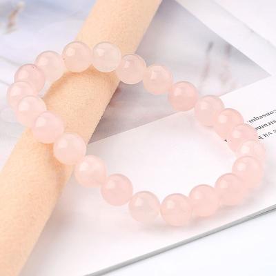 China The Casual Natural Stone Round Bracelet 8mm 5A Rose Quartz Crystal Beads Jewelry Bead For Women Men Women Jewelry Gift for sale