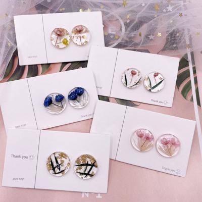 China Small summer cute fresh transparent round girl's geometric resin dried flower earrings plant real flower rose earrings for sale