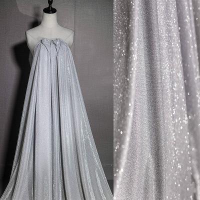 China Premium White Stretch Sparkle Sparkle Stretch Tulle Fabric W/Silver Knitted Fabric Sold By The Yard for sale