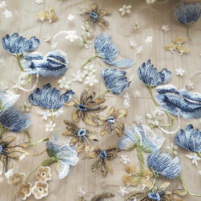 China Breathable Blue Floral Embroidered Tulle Lace Up Fabric For Dress Shirts for sale