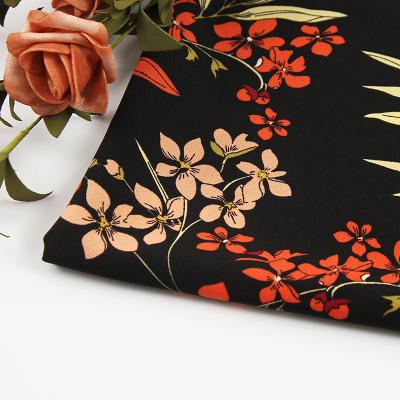 China Plain Black Soft Skin Floral Plant Printed Delicate Chiffon Fabric Texture For Dress Skirt Shirts, By The Meter for sale