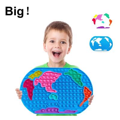 China Funny Toy Silicone Sensory Stress Reliever Toys Large 30cm World Map Puzzle Push Snap Push Button Shaker Person Toys for sale