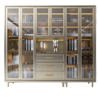 China Adjustable luxury glass bookcase rococo style gold storage cabinet door (height) glass bookcase for sale