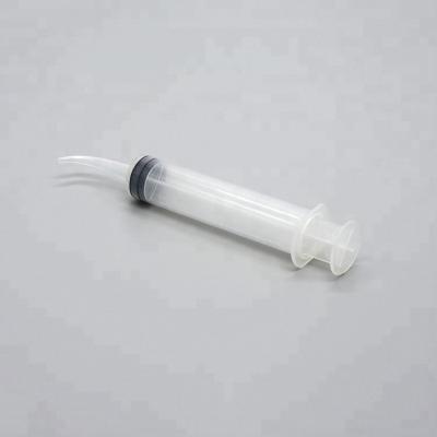 China Medical Grade Plastic Disposable Curved Dental Tip Irrigation Syringe for sale