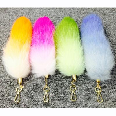 China Cheap bag charm/Fox tail key chain color fox deying tail a variety of dyed blue fox tail for bag handwork made by real fox tail for sale