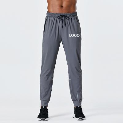 China QUICK DRY QUICK DRY Adult Tops Selling New Design Track Pants Workout Gym Men Sports Pants for sale